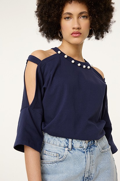Blouse with shoulders cut out