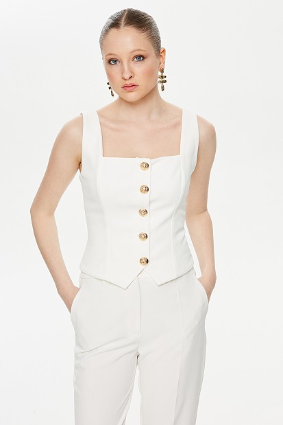 Bustier with bejeweled buttons