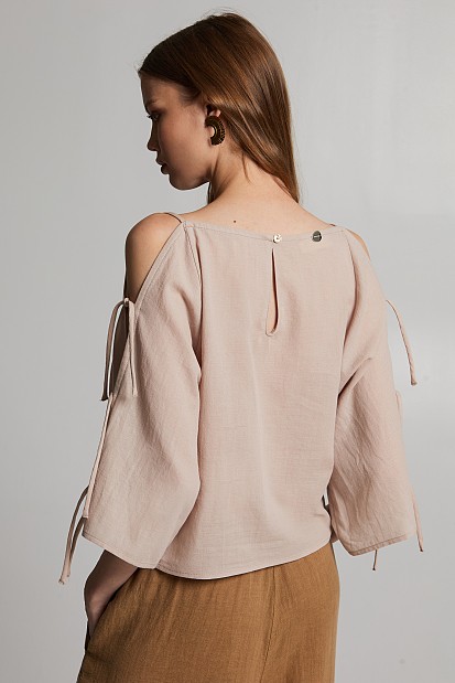 Blouse with cut out sleeves
