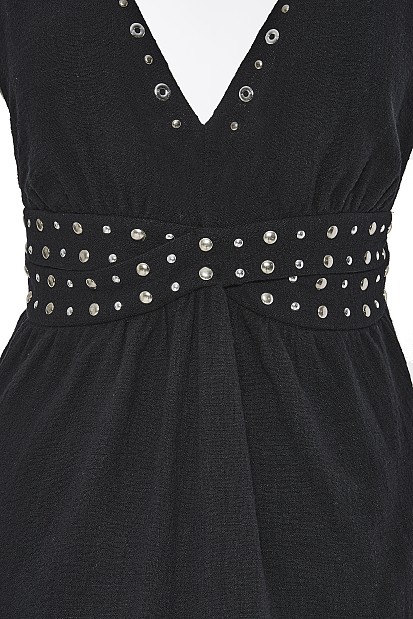 Dress with studs and cut out