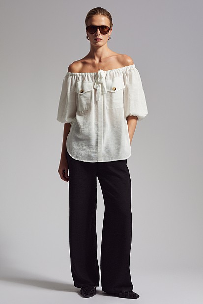 Off-shoulder blouse with decorative pockets