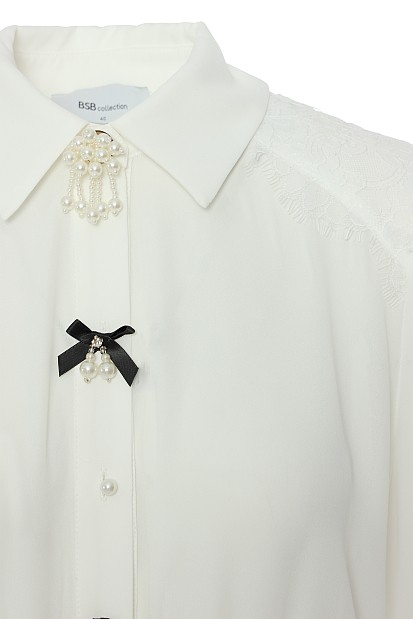 Blouse with long sleeves and pins