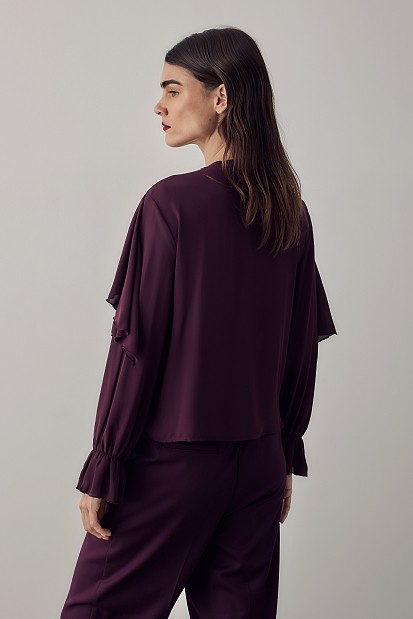 Blouse with ruffles and buttons