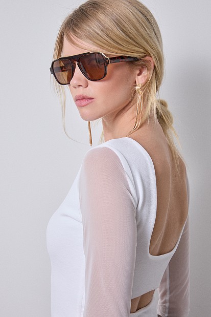 Sheer blouse with cut out back