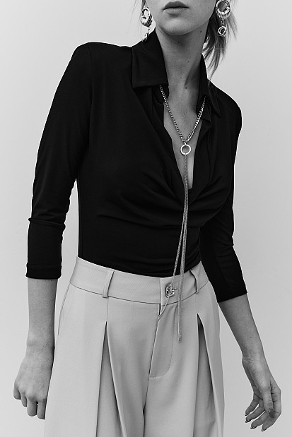 Draped blouse with chain