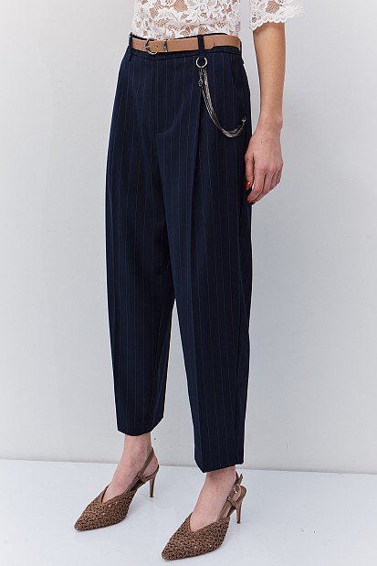 Striped trousers with belt and chain