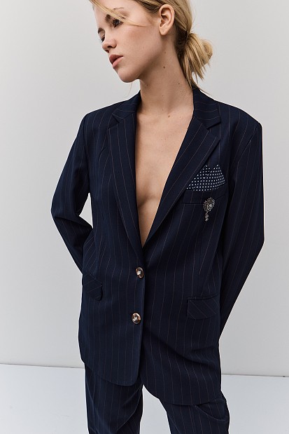 Striped blazer with bejeweled pin