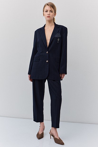 Striped blazer with bejeweled pin