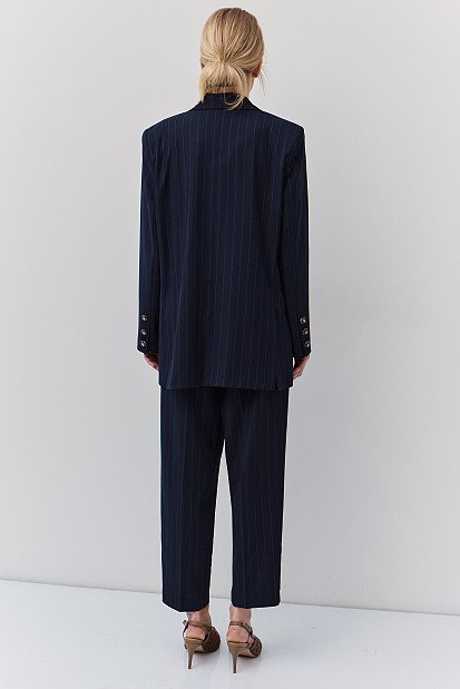 Striped blazer with bejeweled pin