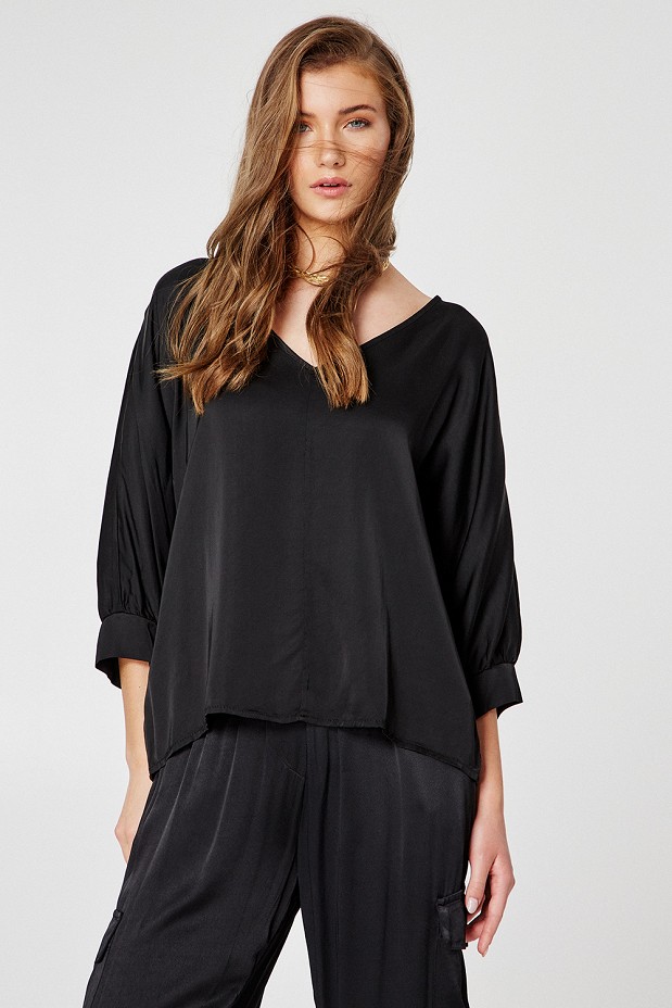 Blouse with bat sleeves