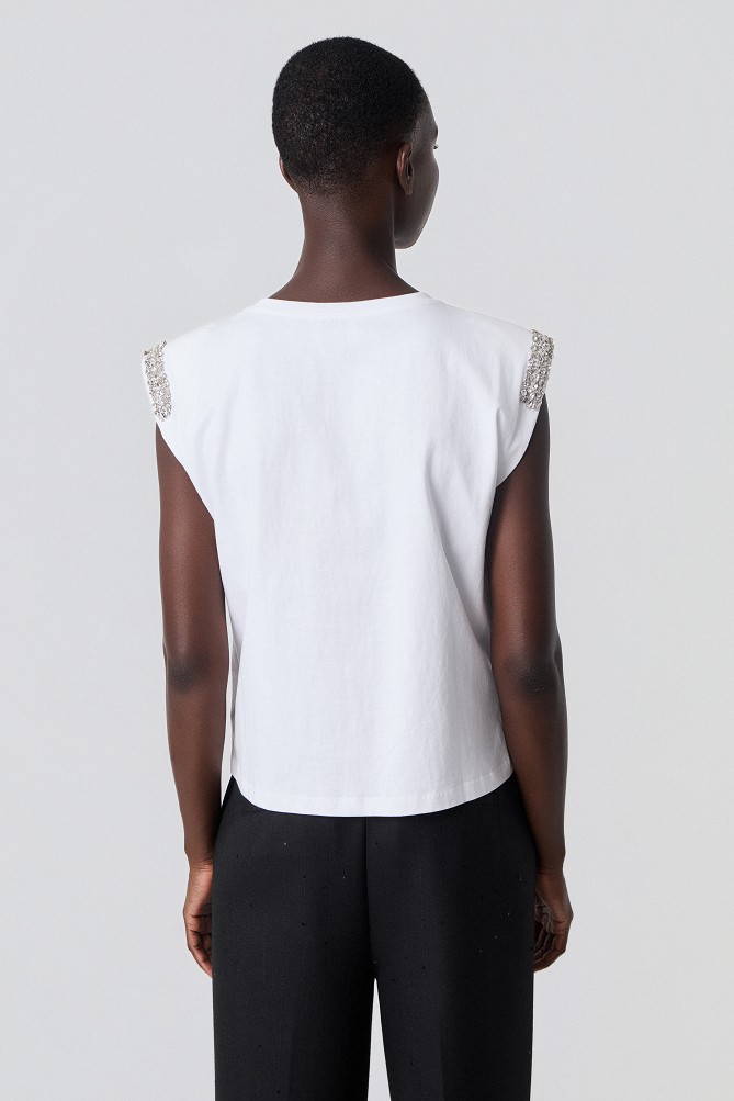 Blusa sin mangas con pedrería