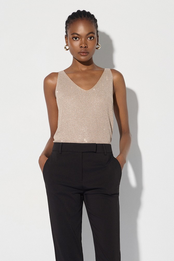 Sleeveless knitted lurex top with rhinestone embellishments