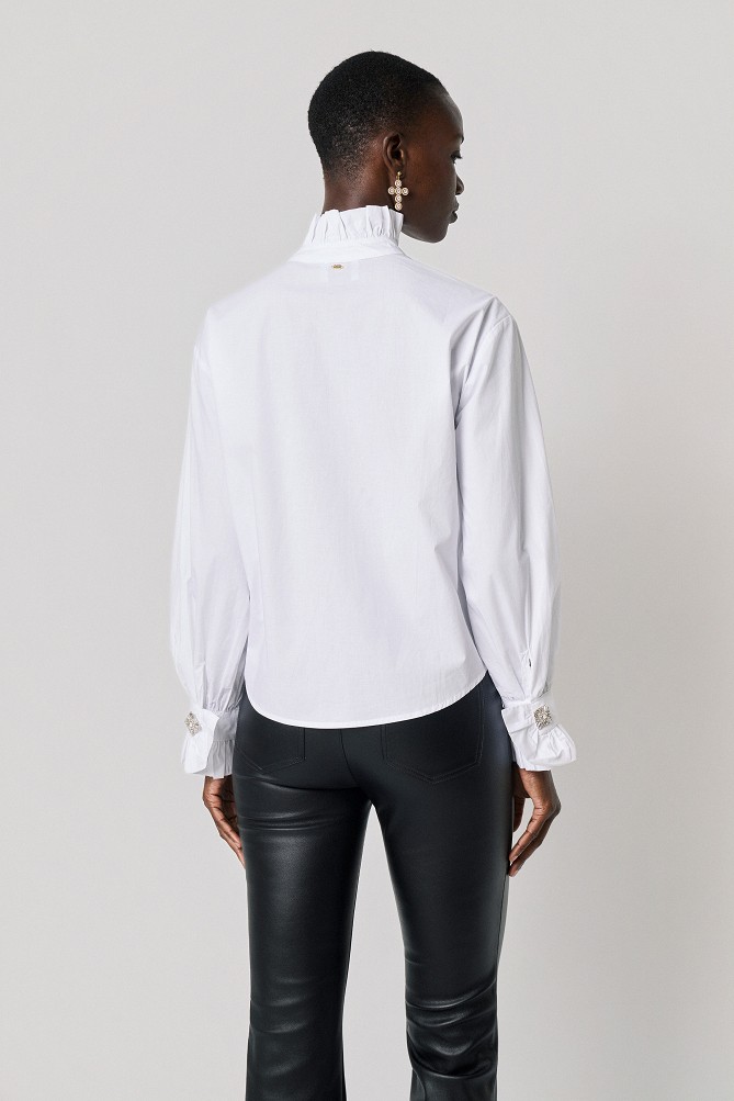 Shirt with ruffle detailing and jewel button