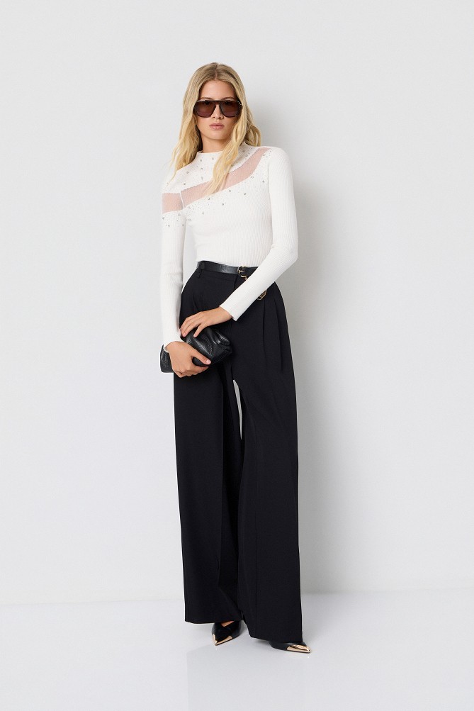 Knitted top with sheer detailing and rhinestone embellishments