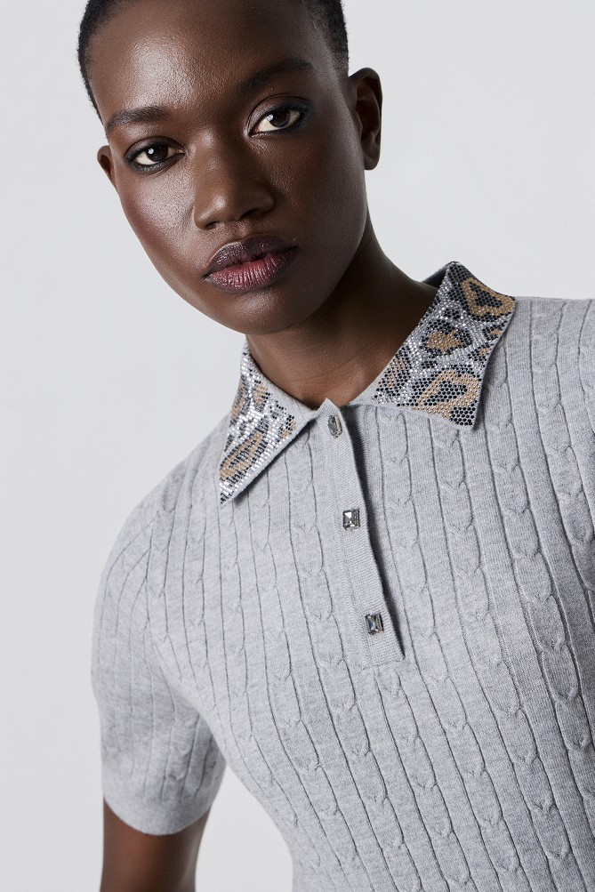 Polo top with a rhinestone collar