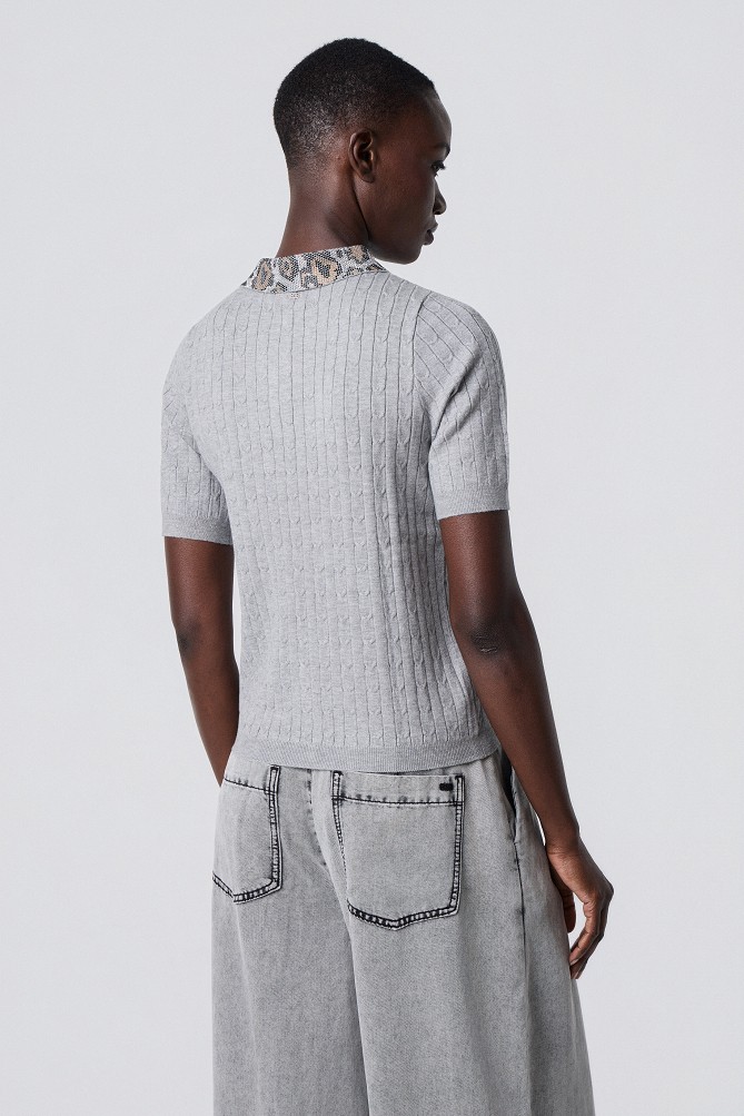 Polo top with a rhinestone collar