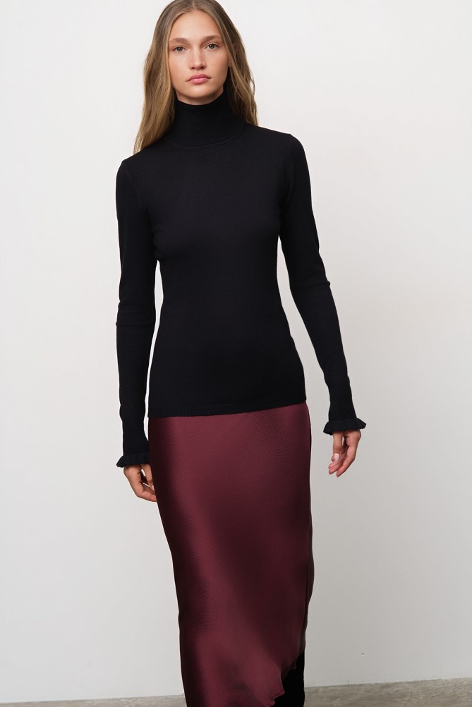 Basic turtleneck with ruffle sleeve details