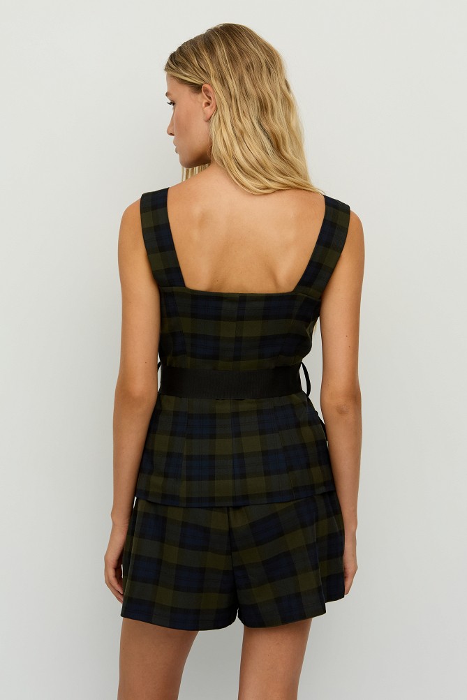 Checked top with a waist belt