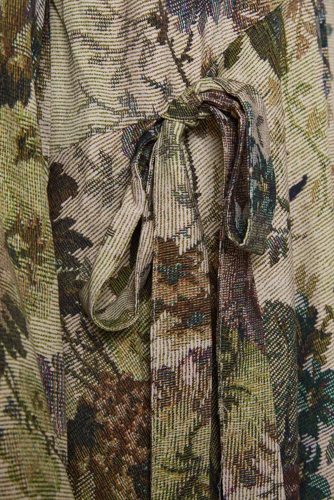 Floral blouse with an asymmetrical hem