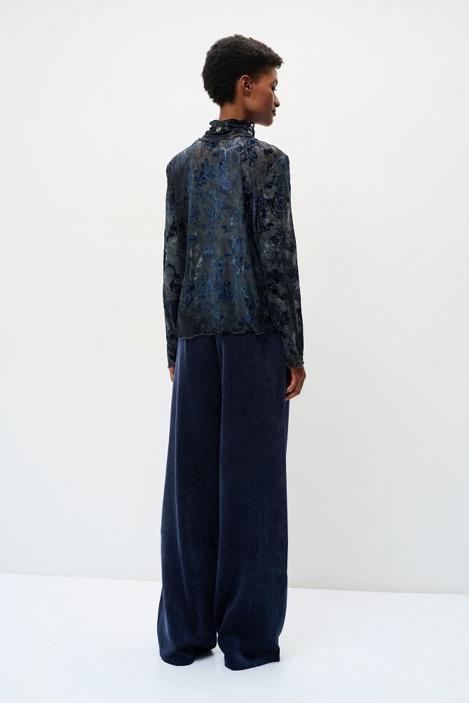 Sheer top with raised floral details