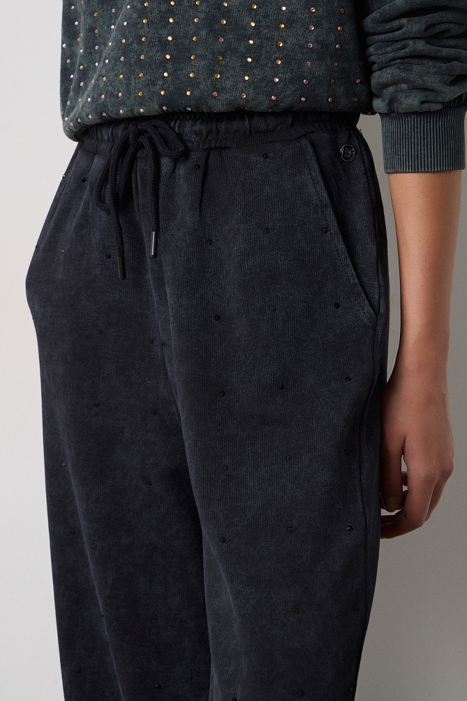Sweatpants with rhinestone embellishments