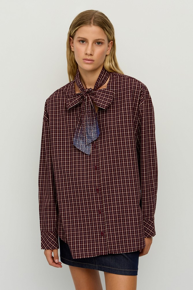 Checked shirt with a rhinestone scarf,