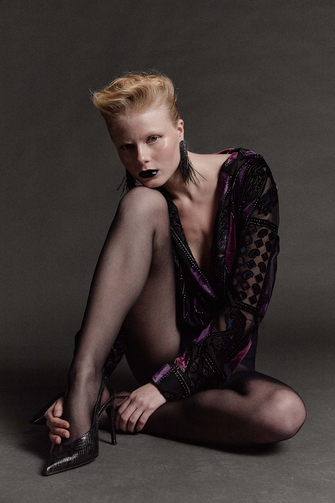 Sheer bodysuit with geometric patterns and velvet details