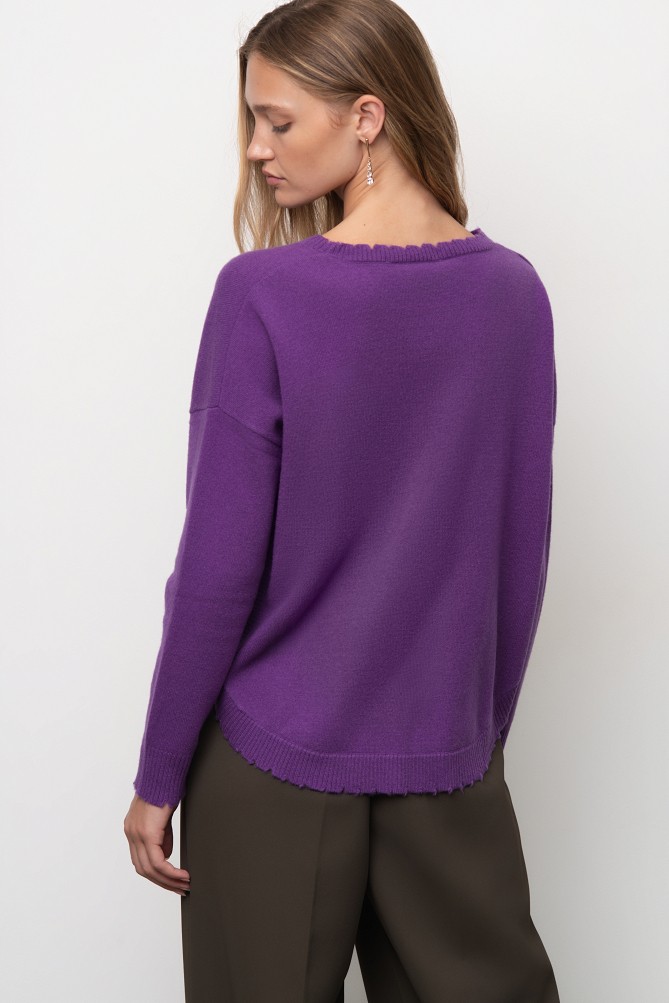 Wool sweater with distressed details