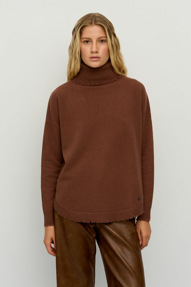 Wool turtleneck sweater with distressed details