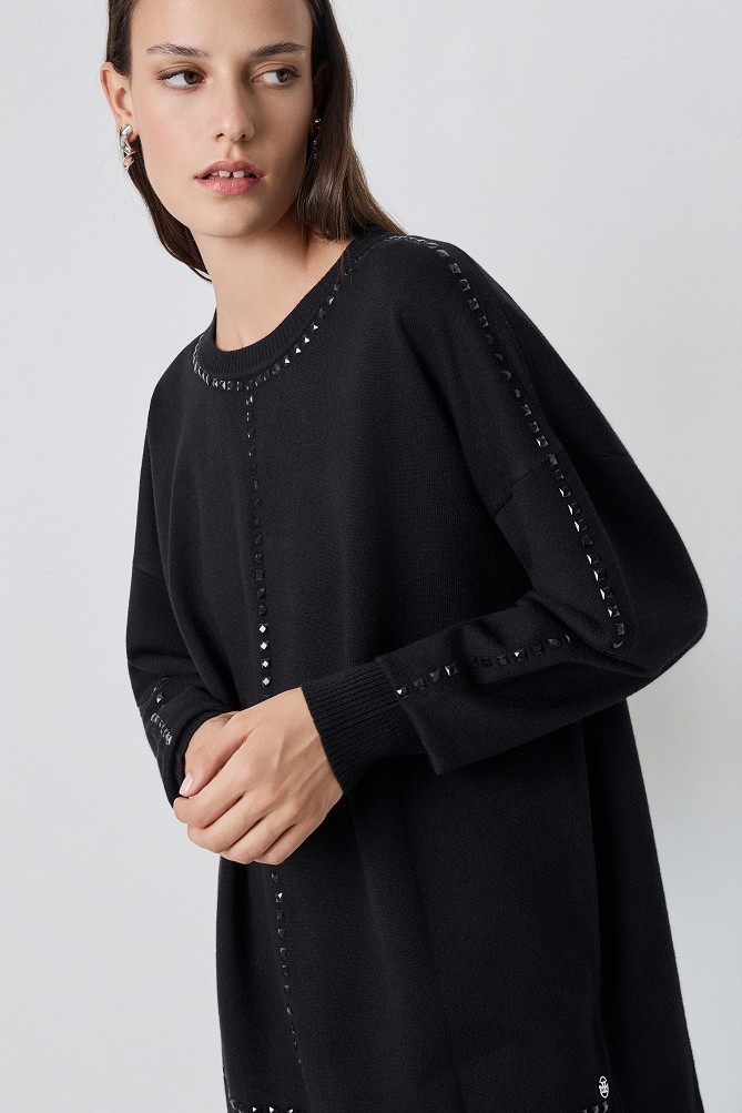Sweater with decorative studs