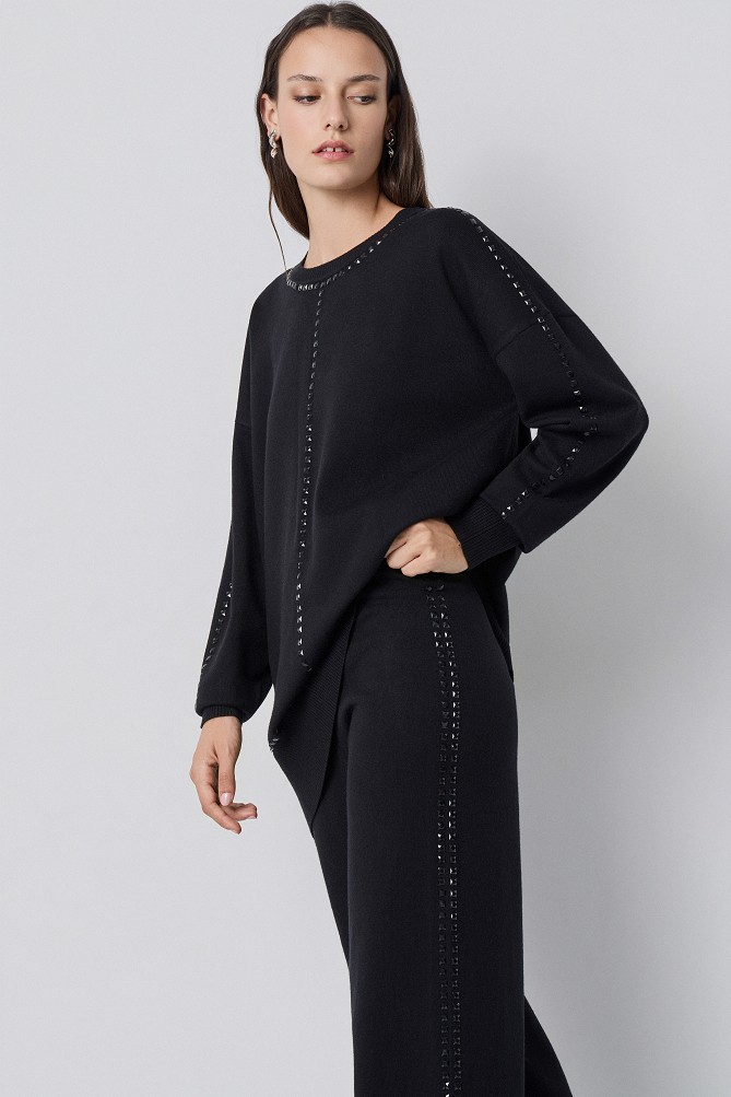 Sweater with decorative studs