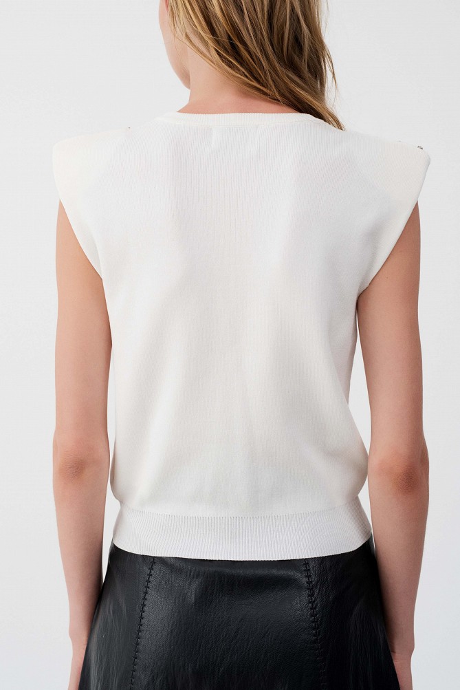 Sleeveless sweater with rhinestone embellishments
