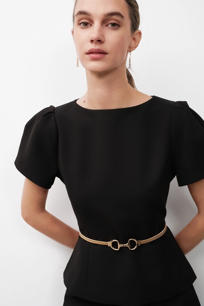 Belt with a metal buckle