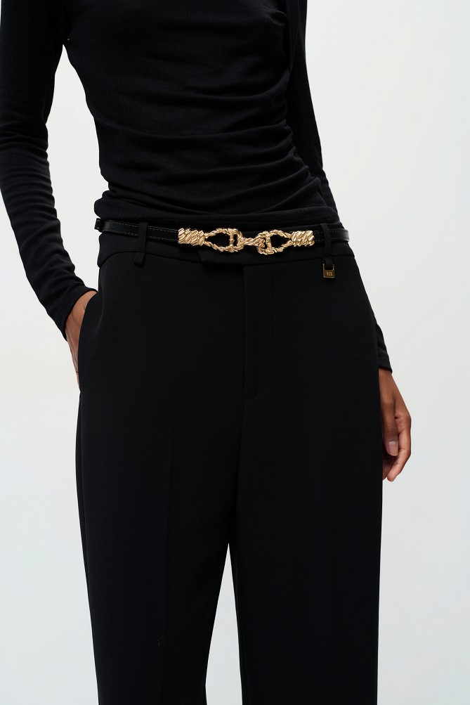 Belt with a metal buckle