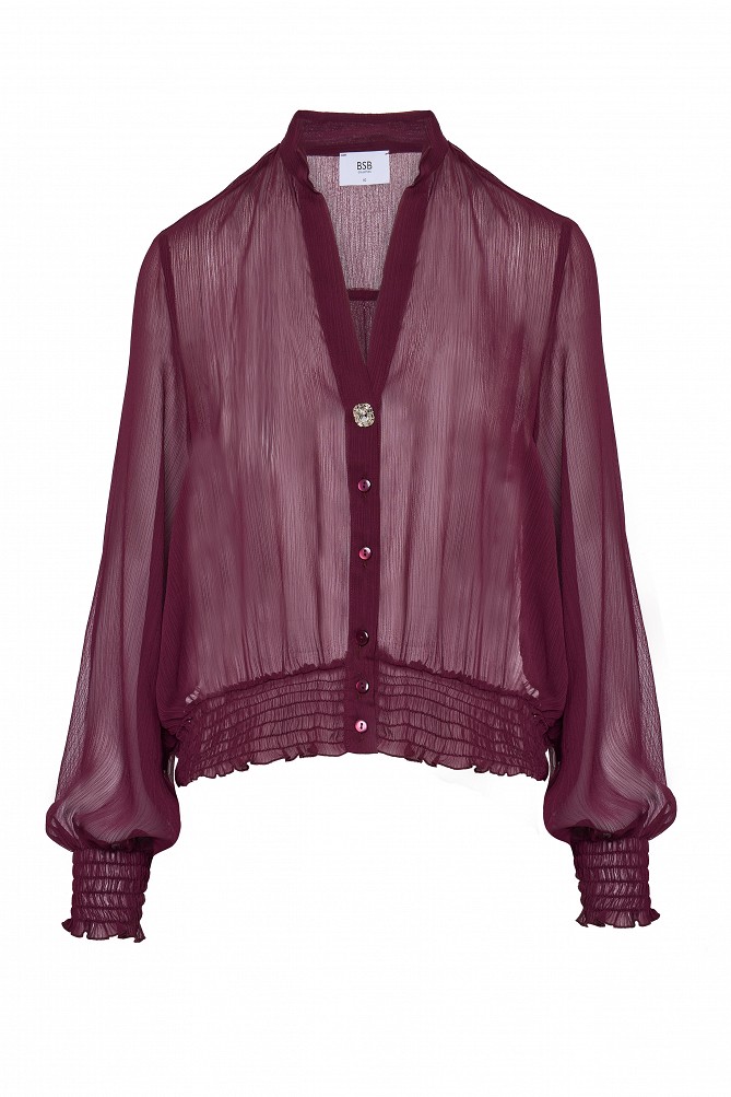 Semi-sheer top with smocked details