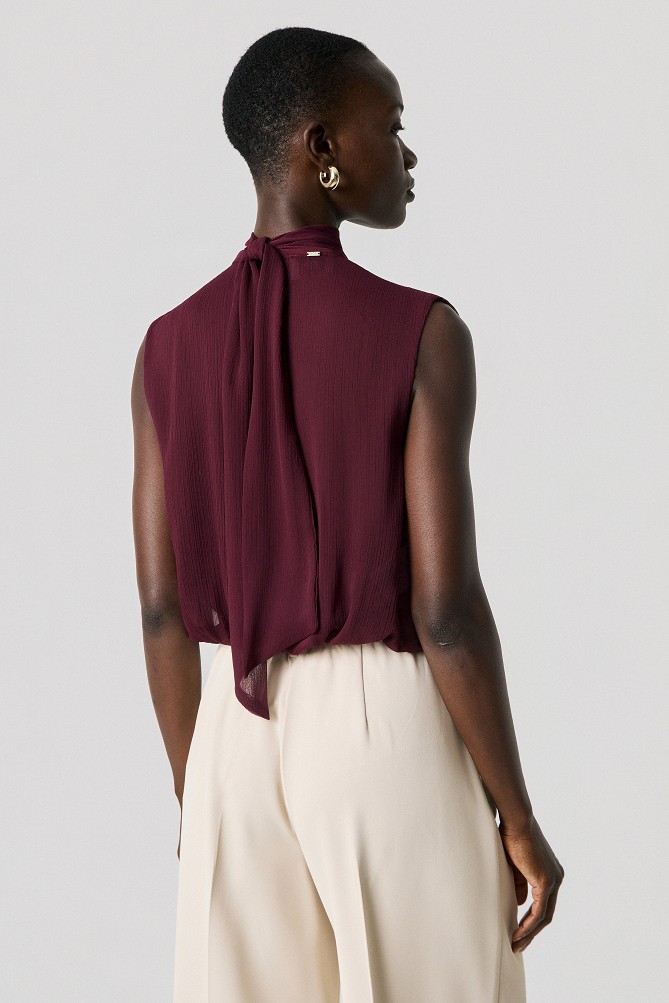 Sleeveless wrap top