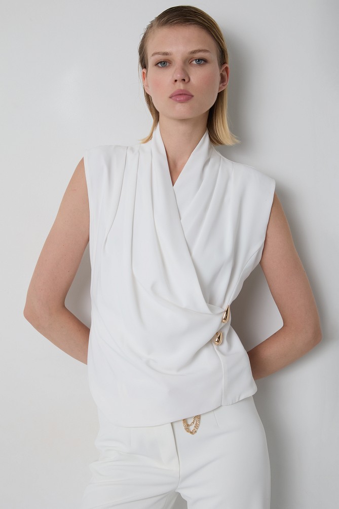 Sleeveless top with a decorative detail