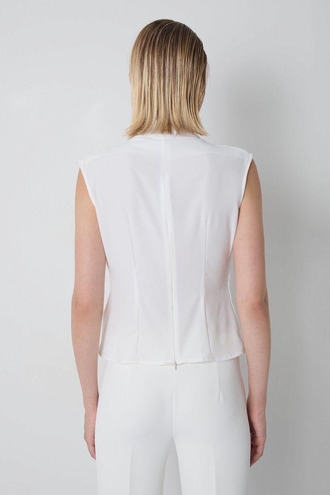 Sleeveless top with a decorative detail
