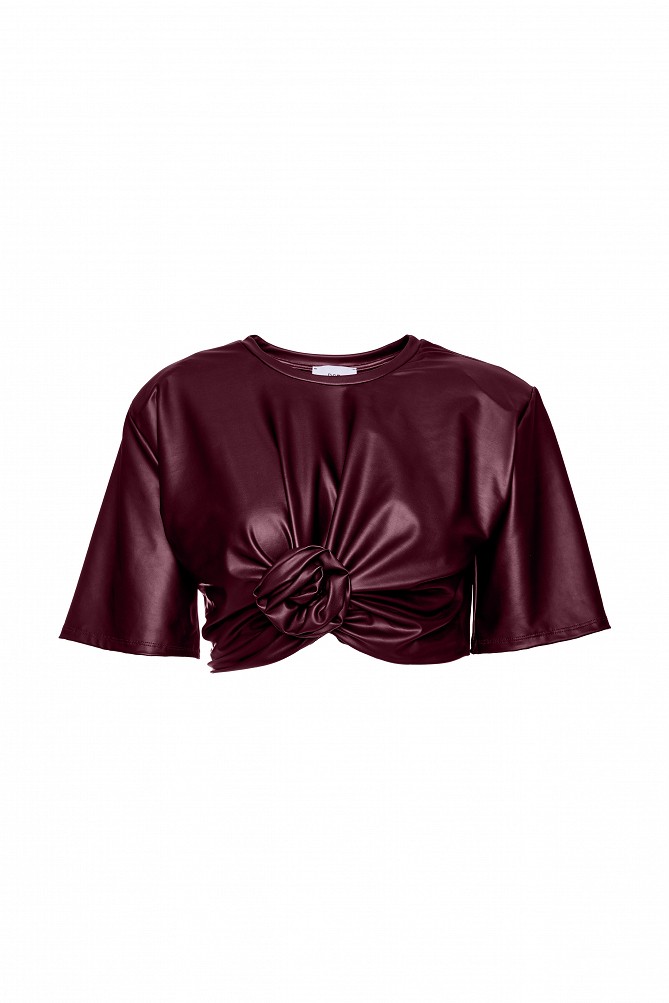Cropped faux leather blouse with decorative flower