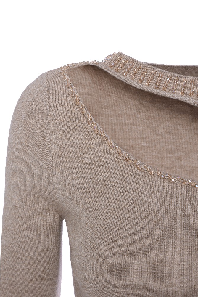 Cut out sweater with beads