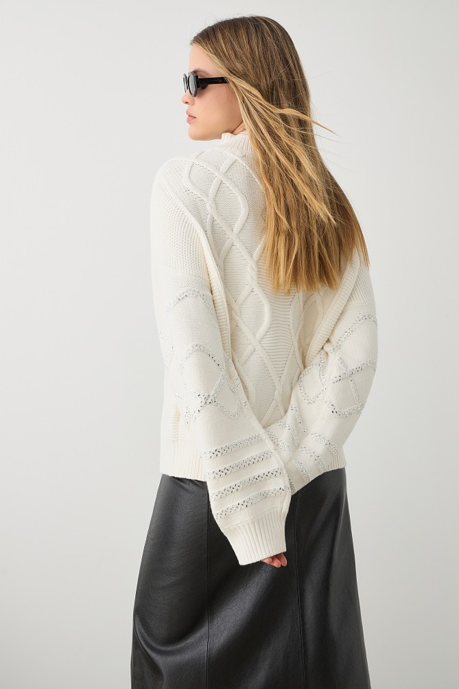 Chunky sweater with turtleneck and rhinestones
