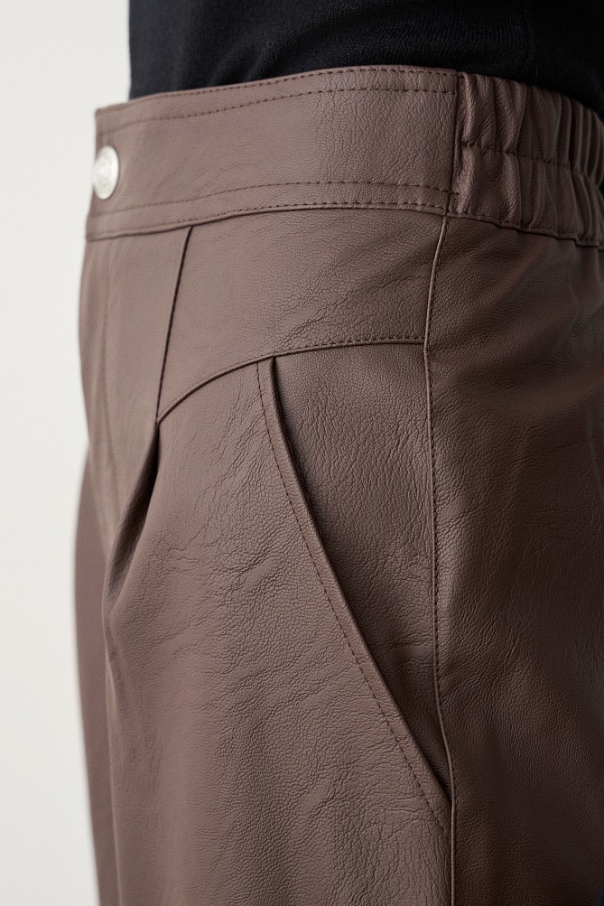 Leather look pants with pleat