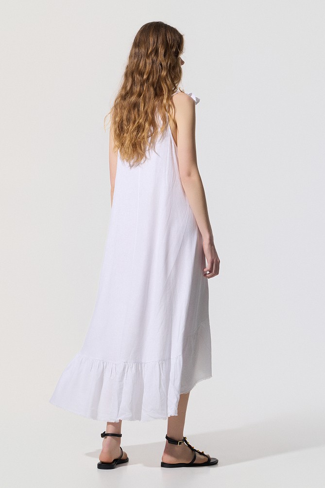 Maxi dress with an asymmetric hem and ruffles