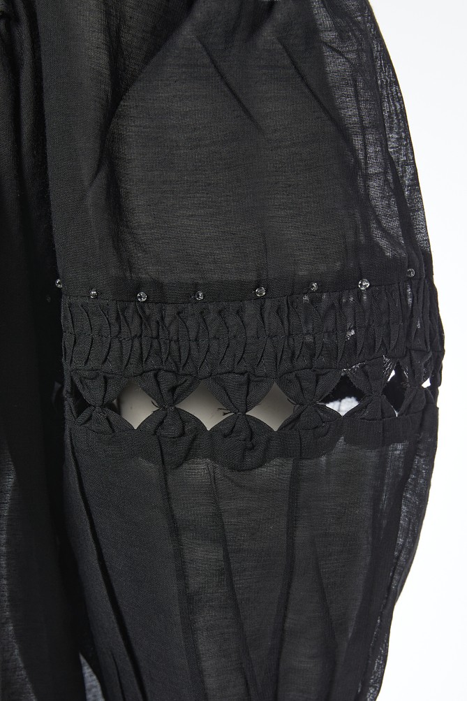Tunic with decorative details