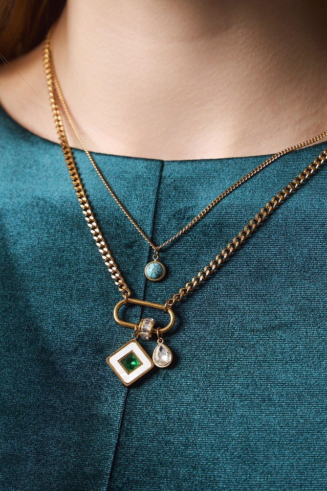 Hanging necklace with chain and charms