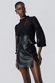 Lace blouse with a leather corset