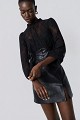 Lace blouse with a leather corset