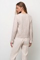 Knitted cardigan with jewel buttons and ruffles
