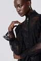Semi-sheer lace blouse