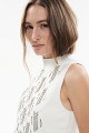 Sleeveless knitted sweater with rhinestones